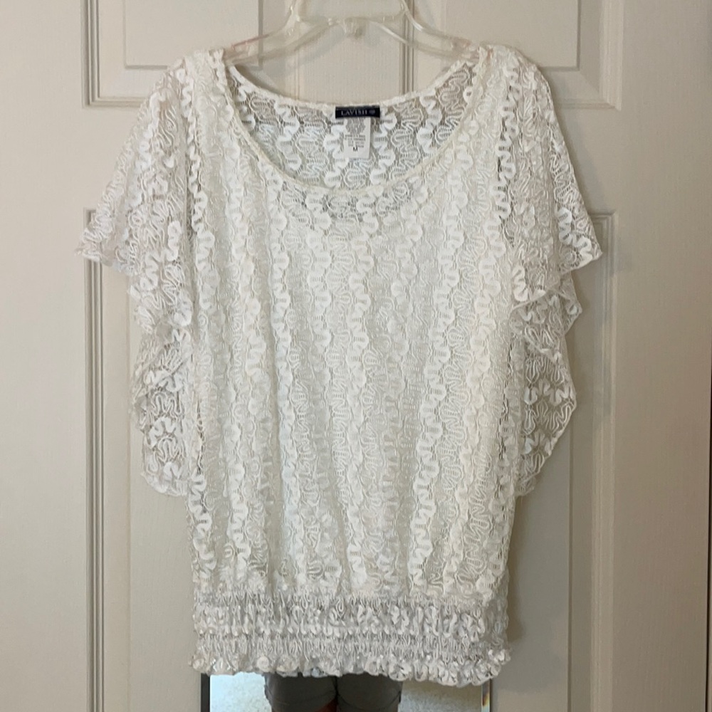 Lacy blouse with elastic waist and flowy sleeves